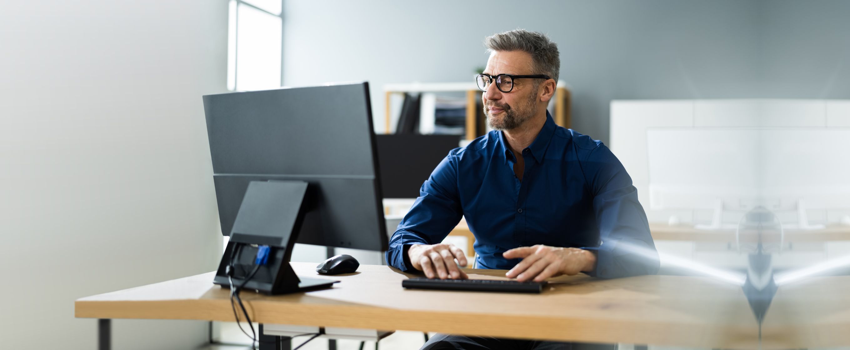 man on computer