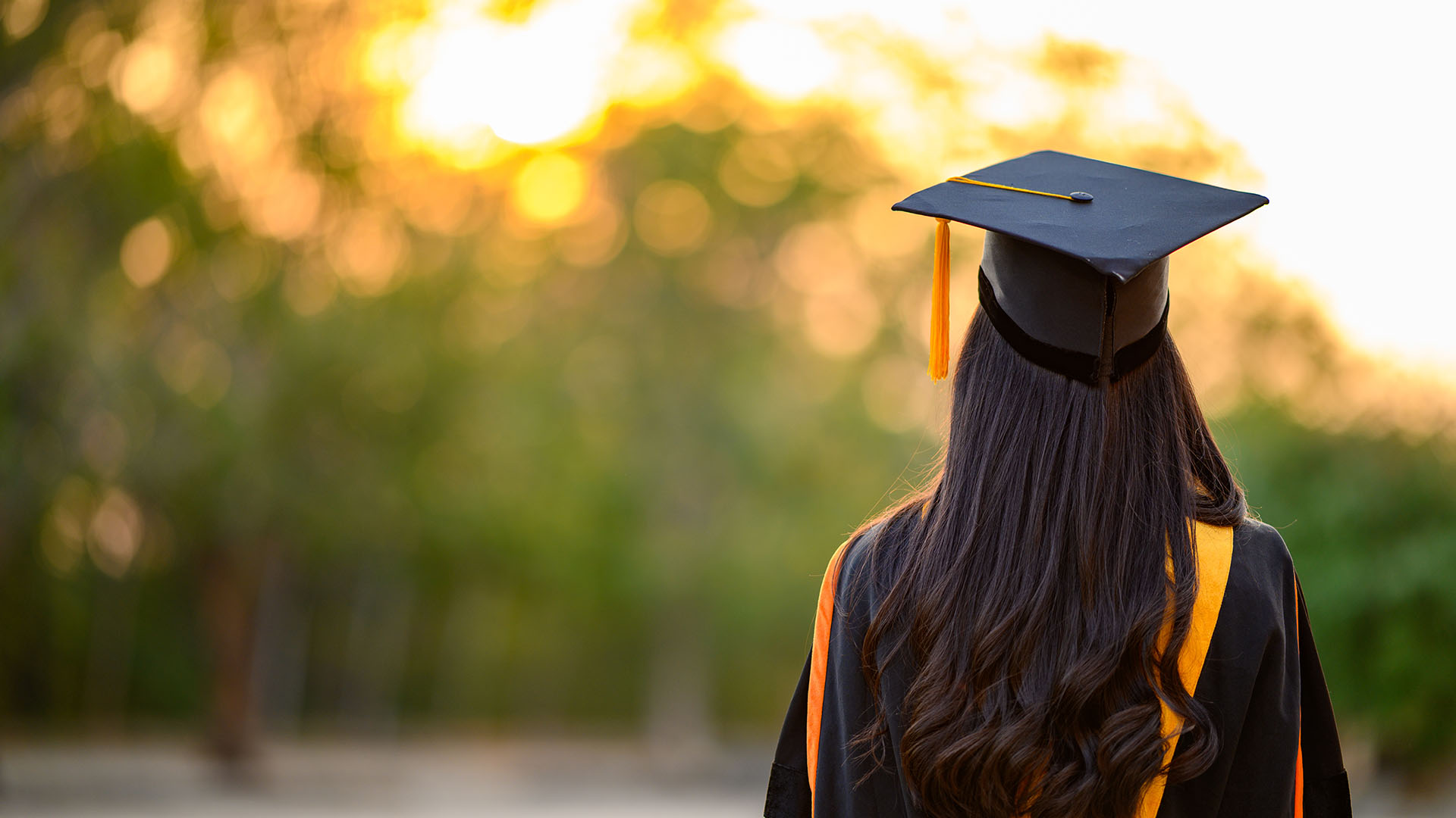 Female in graduation cap and gown
