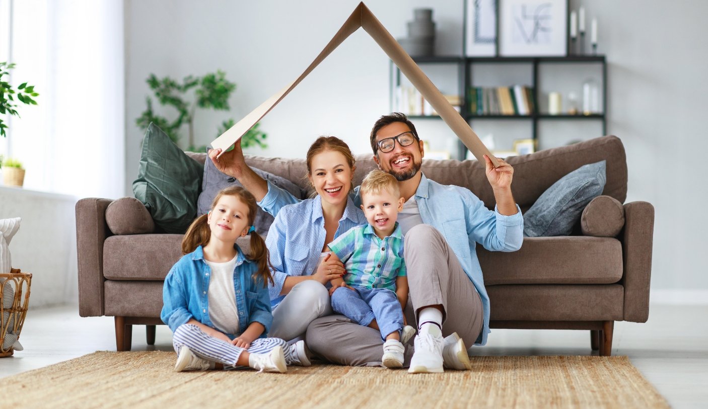 family sitting in house