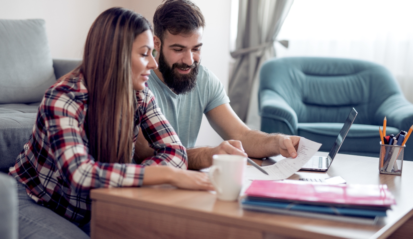 man and woman budgeting