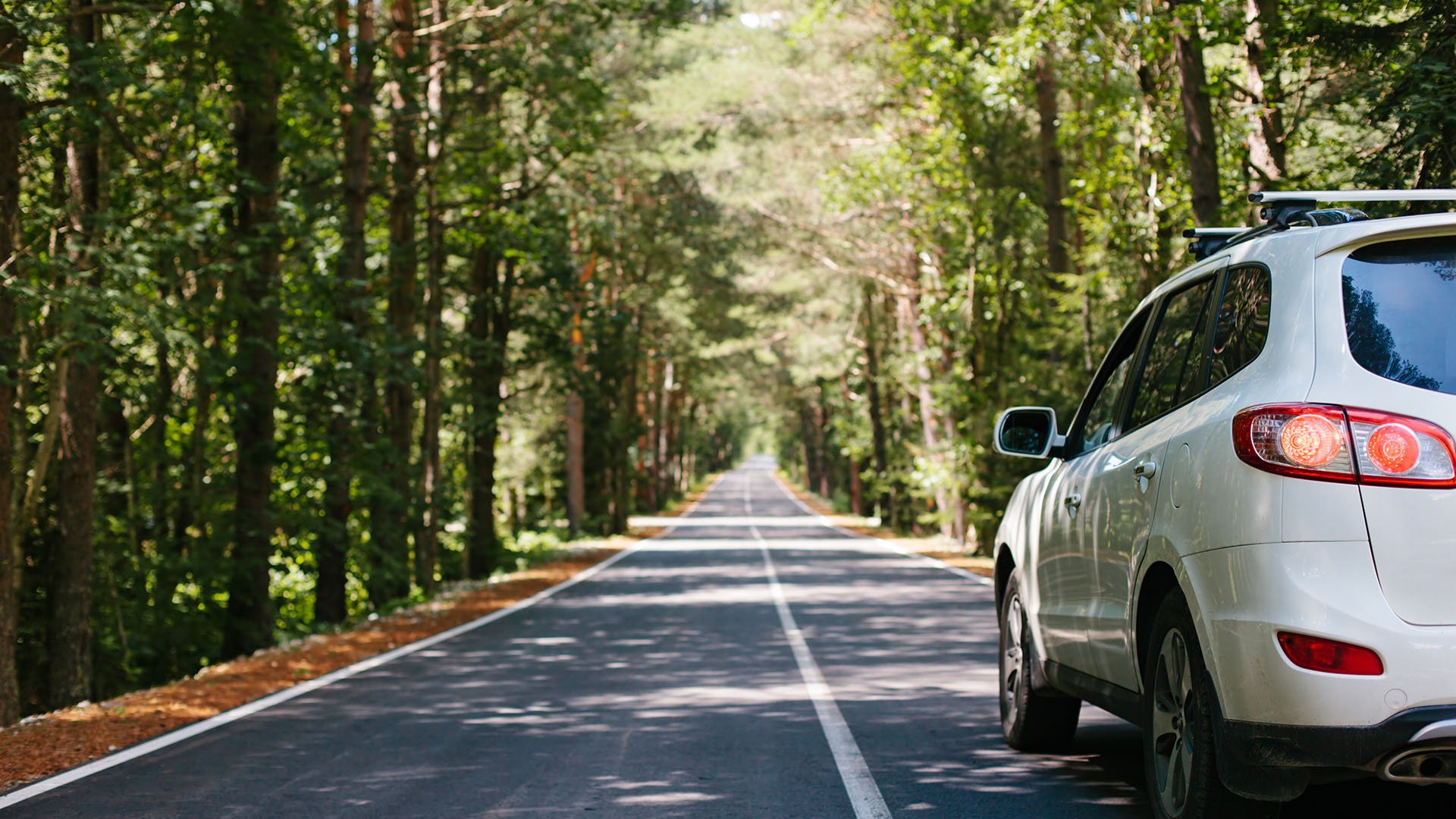 Car driving down road