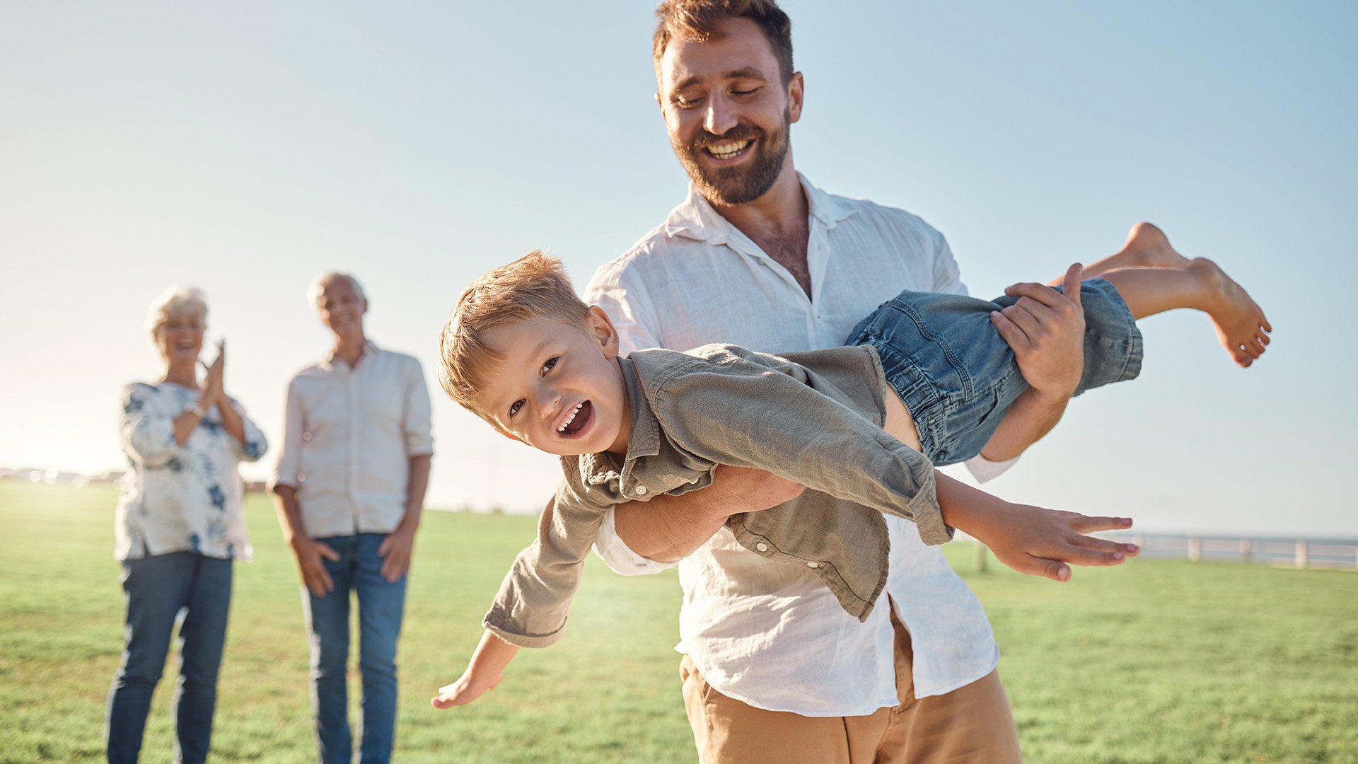 Father and son playing outside
